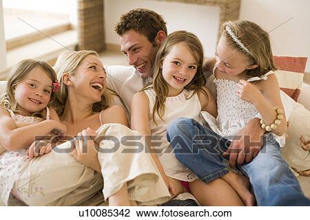 Stock Image - Family at home. Fotosearch