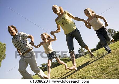 Picture - Family in Park. Fotosearch