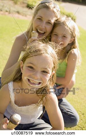 Stock Photo - Family in park. Fotosearch