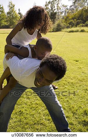 Family in park View Large Photo Image Stock Photograph - Family in park. Fotosearch