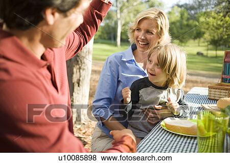 Family in park with picnic View Large Photo Image Stock Photo - Family in park with picnic. Fotosearch