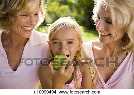 Grandmother, mother and daughter in park View Large Photo Image Picture - Grandmother, mother and daughter in park. Fotosearch