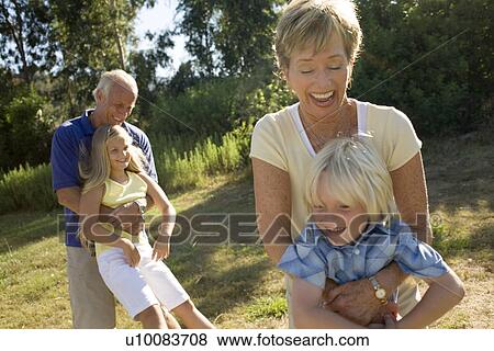 Grandparents and grandchildren View Large Photo Image Stock Photo - Grandparents and grandchildren. Fotosearch