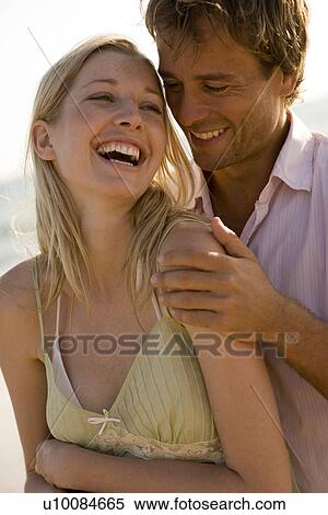 Young couple on beach View Large Photo Image Stock Photography - Young couple on beach. Fotosearch