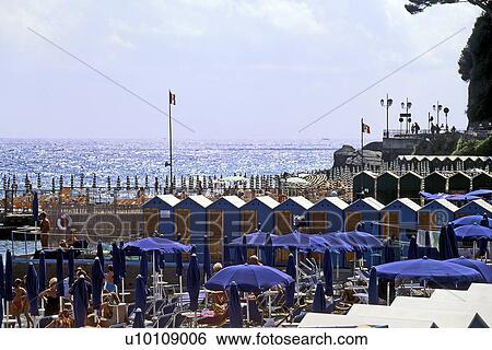 Blue bathing huts and umbrellas Santa Margherita Italy View Large Photo Image Stock Photograph - Blue bathing huts and umbrellas Santa Margherita Italy. Fotosearch