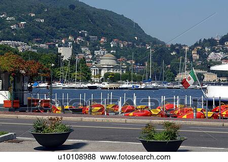 Stock Photo - Como-lakeside promenade -rental boats. Fotosearch