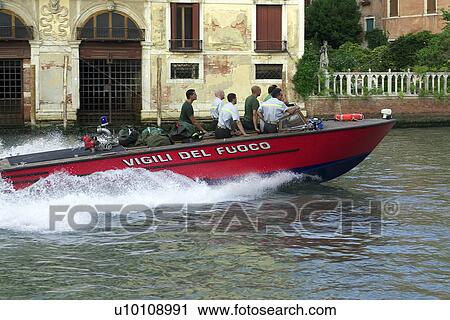 Stock Image - Fire boat ( vigili del fuoco) at speed on Grande Canal, Venezia. Fotosearch
