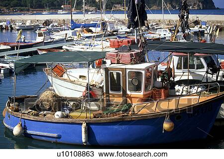Stock Image - Fishing Boat in harbour Elba Italy. Fotosearch