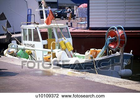 Fishing boat in harbour Southern France View Large Photo Image Stock Image - Fishing boat in harbour Southern France. Fotosearch