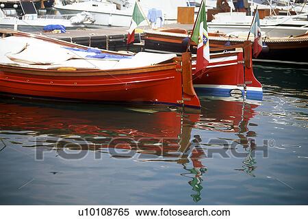 Stock Photography - Red boats at dock in Santa Margherita near Portofino Italy. Fotosearch