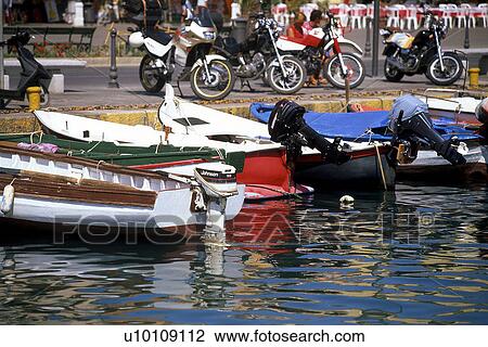 Stock Image - Small boats at harbour edge Portofino Italy. Fotosearch