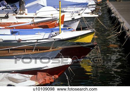 Stock Photo - Small boats at harbour edge Portofino Italy. Fotosearch