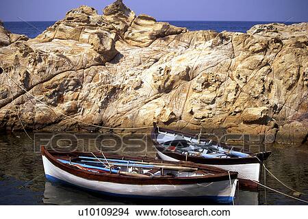 Small rowboats moored in rocky inlet Elba Italy View Large Photo Image Picture - Small rowboats moored in rocky inlet Elba Italy. Fotosearch