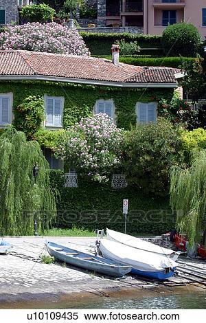 Stock Photography - Varenna -boats on beach. Fotosearch
