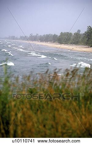 Stock Image - Lake Ontario shoreline wind and waves. Fotosearch
