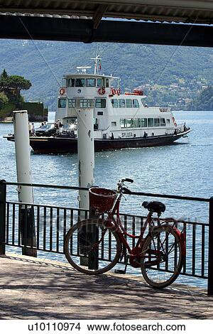 Picture - Varenna -ferry and harbour. Fotosearch