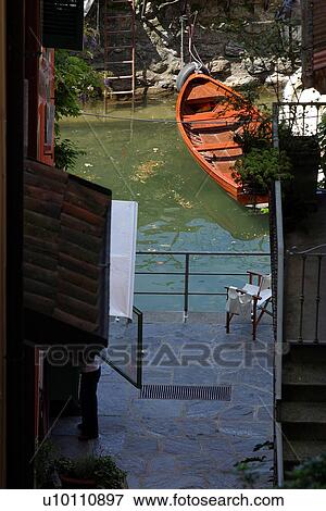 Stock Photo - Varenna - view from alleyway to lake. Fotosearch