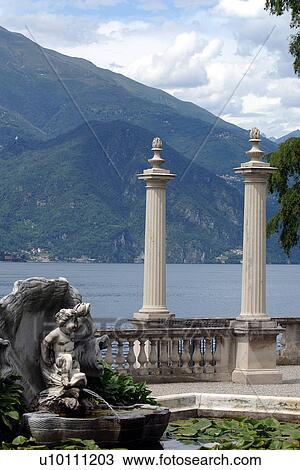 Stock Image - Villa Melzi, Bellagio -view of lakeside balustrade and columns. Fotosearch