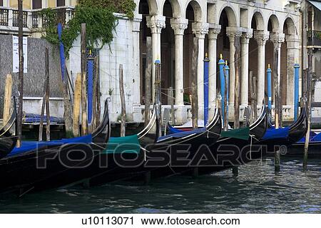 Blue covered gondolas View Large Photo Image Stock Image - Blue covered gondolas. Fotosearch