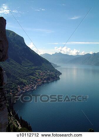 Stock Image - Castello di Vezio-view of lake shoreline. Fotosearch
