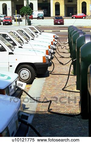 Stock Photography - Electric Cars recharging. Fotosearch