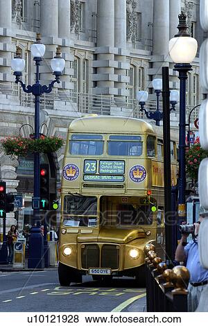 London double decker bus, gold View Large Photo Image Stock Photo - London double decker bus, gold. Fotosearch