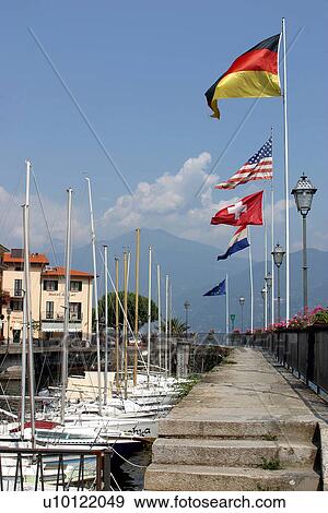 Stock Photo - Menaggio-harbour promenade, yacht basin. Fotosearch