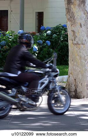 Motorbike in motion View Large Photo Image Stock Photo - Motorbike in motion. Fotosearch