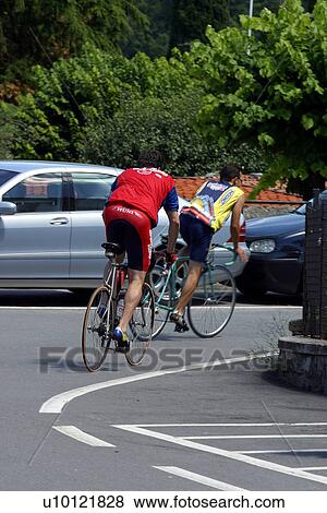 Stock Photo - two cyclists on bike. Fotosearch