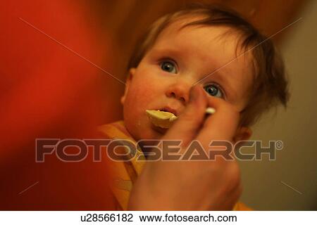 hand, arm, mother, food, feed, feeding View Large Photo Image Stock Image - hand, arm, mother, food, feed, feeding. Fotosearch