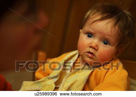 Stock Photograph - hand, arm, mother, food, feed, feeding. Fotosearch