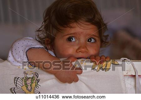 Stock Photograph - kid, child, baby, toddler, little, little girl. Fotosearch