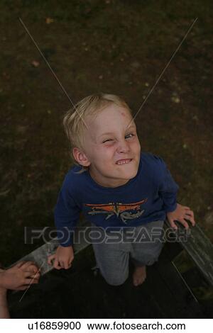 Stock Image - Kid, Child, boy, young, outdoors, day. Fotosearch