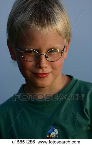 Stock Photograph - Kid, Child, boy, young, young boy, little boy. Fotosearch