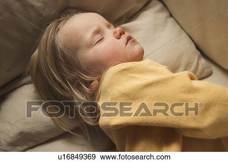 Stock Photo - napping, nap, sleep, slumber, baby, asleep. Fotosearch