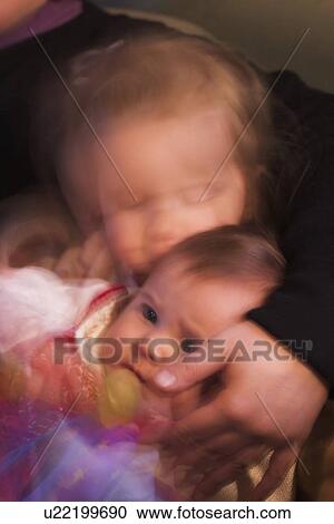 Stock Image - Three People, Babies, Children. Fotosearch