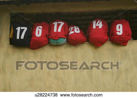 Stock Photo - football t-shirts, t-shirts, football jerseys, jerseys, clothes, cloth. Fotosearch