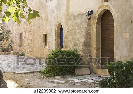 Stock Image - Building Exterior, Door, Day, Building Structure, Arch. Fotosearch