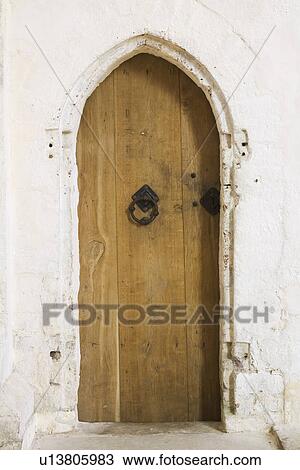 Stock Image - Day, Outdoors, Door, Arch. Fotosearch