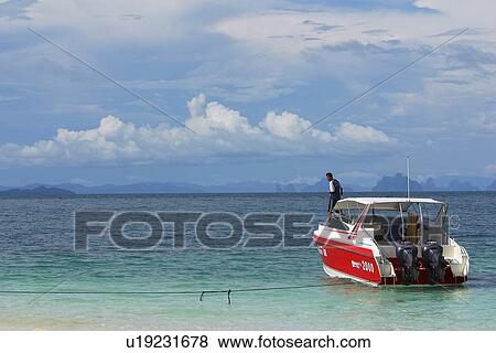 Beach, shore, boats, motor boats, sand View Large Photo Image Stock Photo - Beach, shore, boats, motor boats, sand. Fotosearch