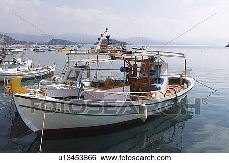 Stock Photograph - Boat, Close-Up, Clouds, Coastal, Day. Fotosearch