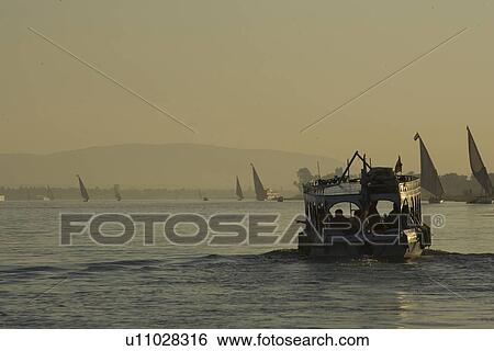 Floating On Water, Journey, Large Group Of People, Mode Of Transport View Large Photo Image Stock Photograph - Floating On Water, Journey, Large Group Of People, Mode Of Transport. Fotosearch