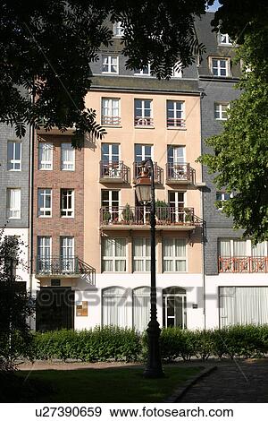 Stock Photo - outdoors, home, shingles, rooftop, window frame, panes. Fotosearch