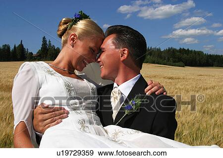 Stock Photo - woman, adults, together, blonde, couple. Fotosearch