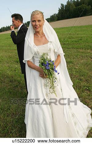 Stock Image - woman, couple, gown, formal, function. Fotosearch