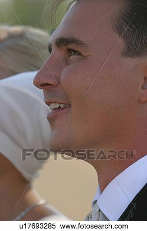 Stock Photography - woman, couple, gown, formal, function. Fotosearch