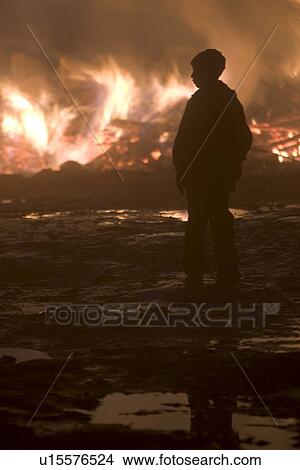 Picture - Bonfire, Burning, Close-Up, Flame, Hands In Pockets. Fotosearch