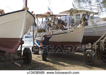 Stock Photo - Beach, Boats, Calm, Coast, Day. Fotosearch