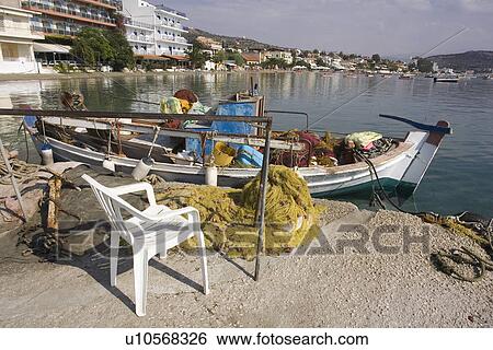 Stock Photograph - Boat, Car, Chair, River, Rope, Sea. Fotosearch