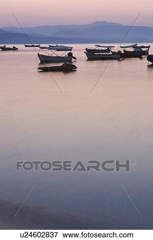 Stock Photo - Boat, Fishing Boat, Dusk, Anchored. Fotosearch